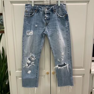 Distressed Levi’s Blue Jeans